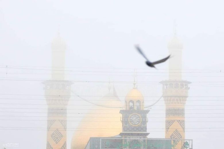 بالصور..مع ساعات الصباح الاولى الضباب يغطي كربلاء