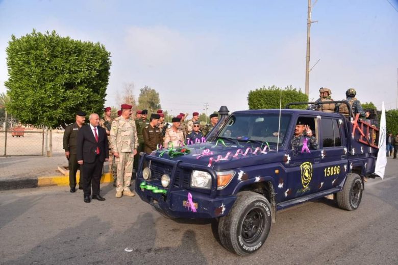بالصور.. محافظ كربلاء يحضر استعراضا عسكريا بمناسبة ذكرى يوم النصر