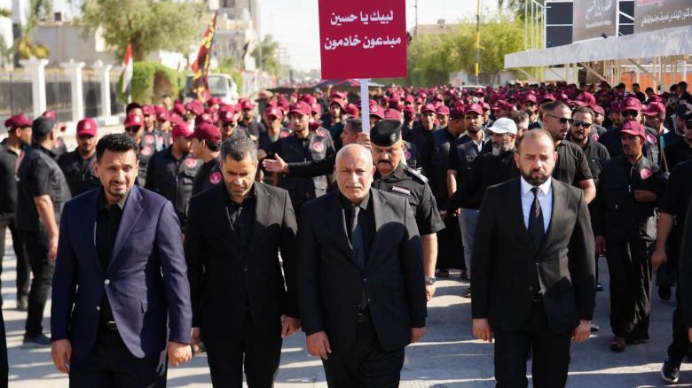 محافظ كربلاء يشارك في مسيرة 